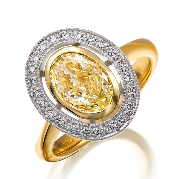 Brilliant cut oval yellow diamond halo ring Holloway Diamonds