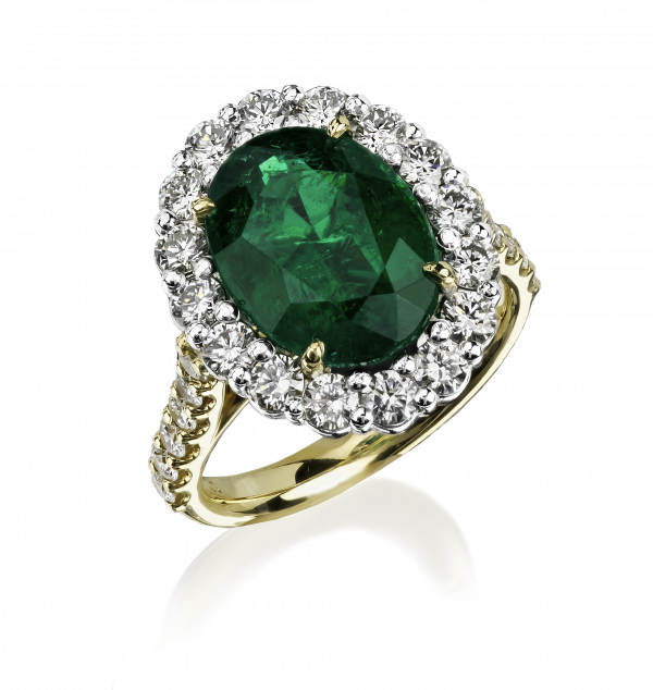 5ct emerald oval ring with 1.63ct of diamonds in the cluster and band
