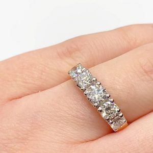 5 diamonds in a white gold band all hand chosen