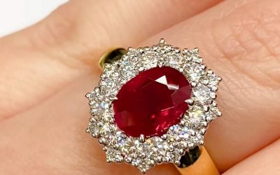 Oval cut Ruby double halo ring