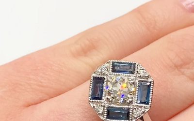 Brilliant old cut diamond with 4 sapphires ring
