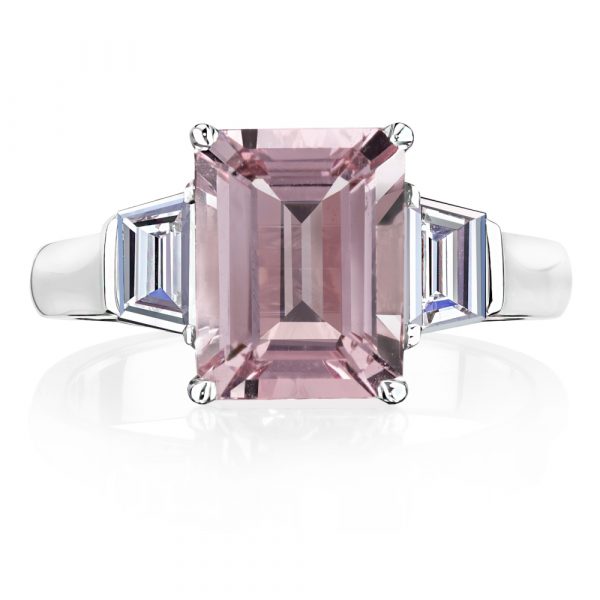 Emerald cut morganite with trapezoid diamonds either side