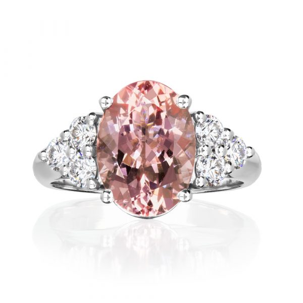 Oval cut morganite with six round brilliant cut diamonds