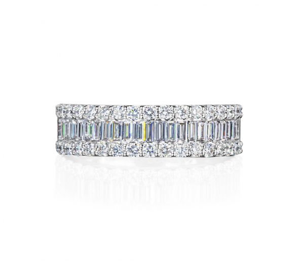 One Diamond Band in 18 karat white gold comprising twenty-three baguette cut diamonds totalling 0.65ct between two rows comprising thirty-four round brilliant cut diamonds totalling 0.60ct