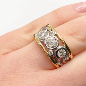 Vine Style ring in yellow and white gold with diamonds