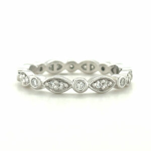 Platinum round brilliant cut diamond ring set into marquise and round shaped bezel settings