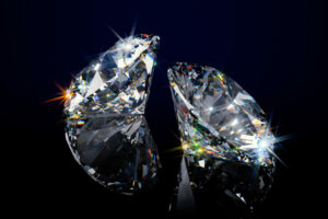 two round sparkling diamonds