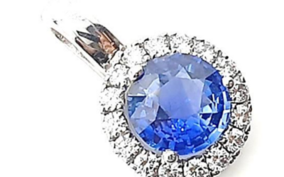 Sapphire with diamond halo pendant