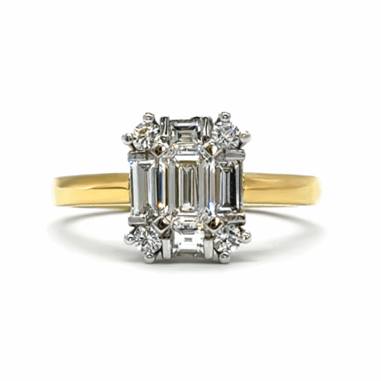 Emerald, Baguette & Round Cut Diamond Ring